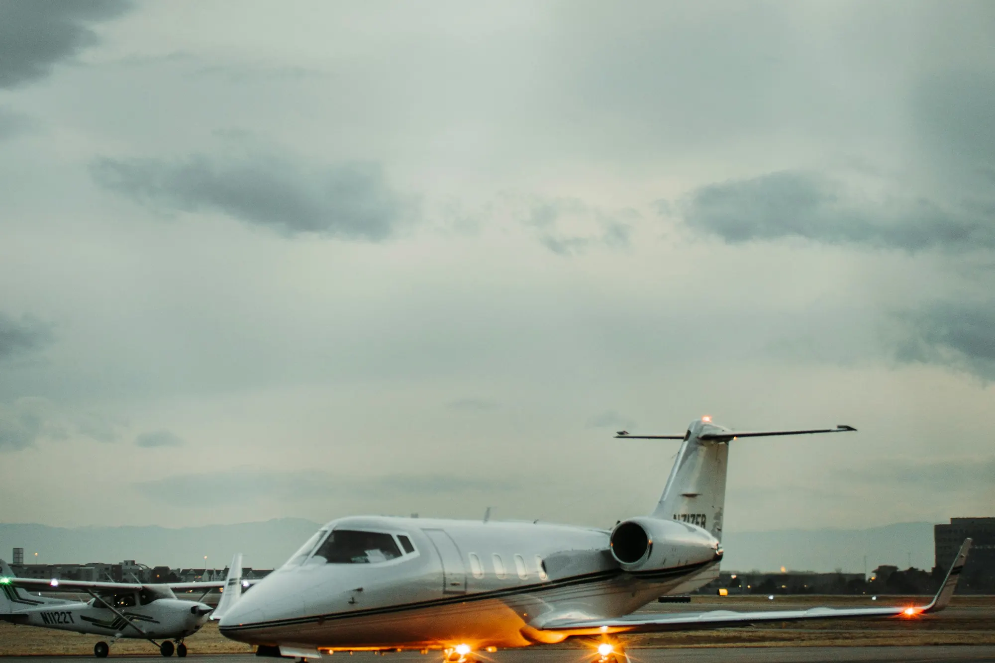 Light jet on a wet runway